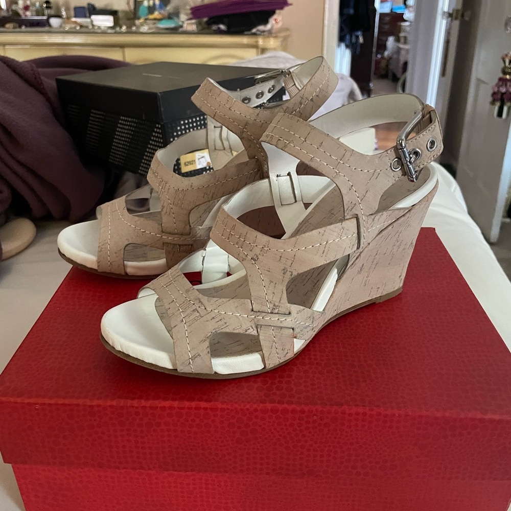 Donald Pliner beige wedges. Size 8.5. great condition, gently worn.